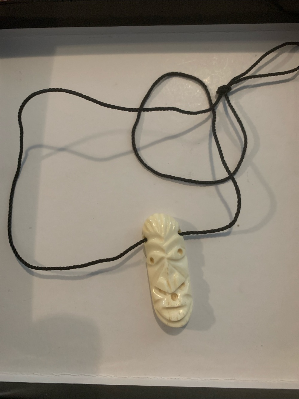 Vintage Hand-Carved Cream Tiki Pendant Necklace on Black Cord unisex